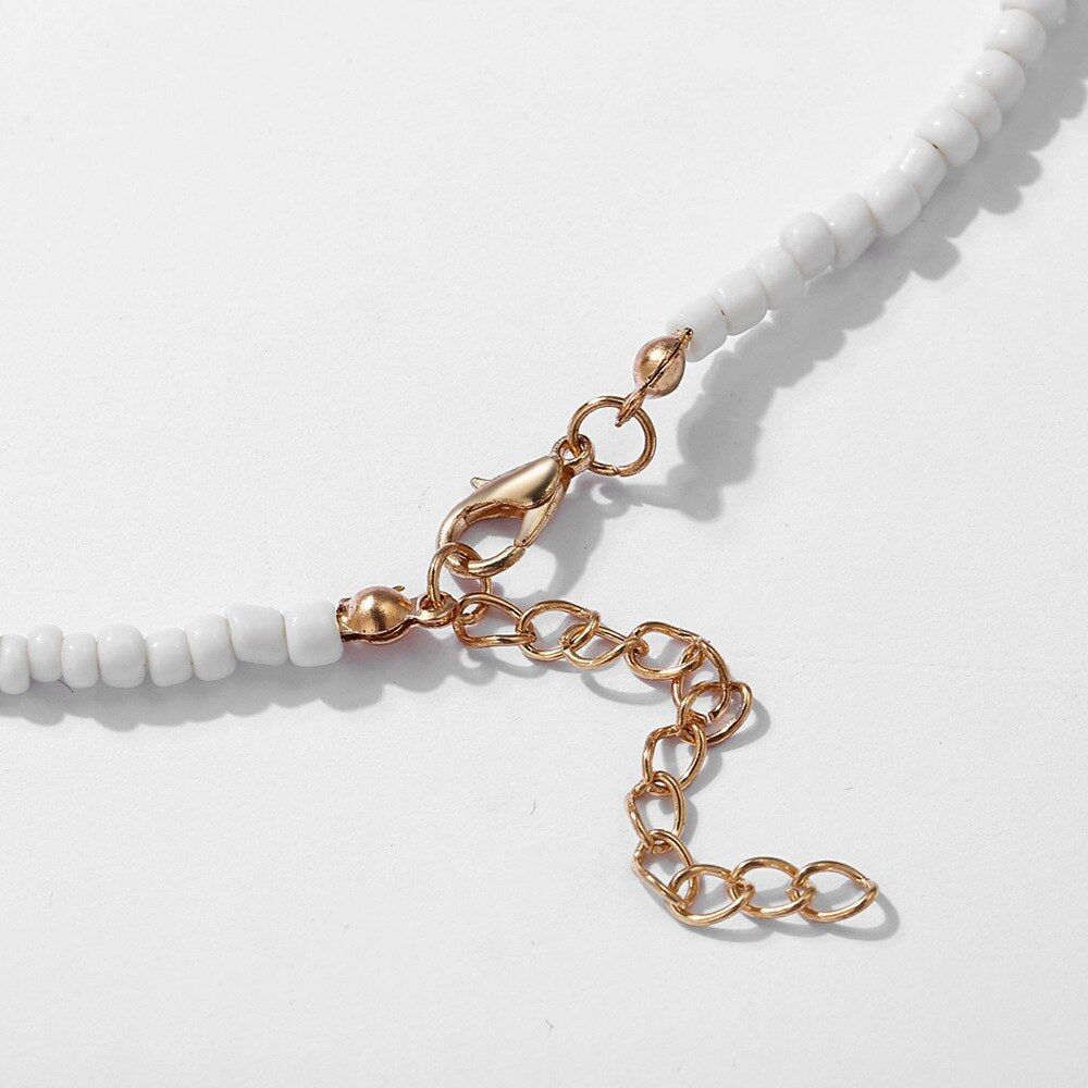 צ׳וקר חרוזים לבן מיקה